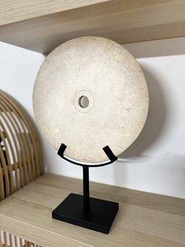 Elegant white decorative stone disc in oriental style, enhanced on a matte black metal base ideal to complement interiors with modern, zen or eclectic styles