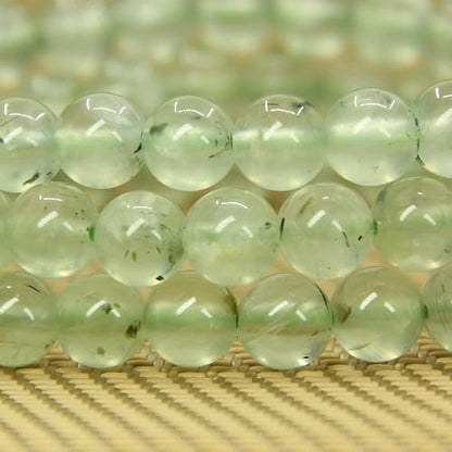 Angelstones Handmade Natural Healing Gemstone 6mm Round Beads Stretch Crystal Bracelet 7 Inch Unisex - color: Prehnite