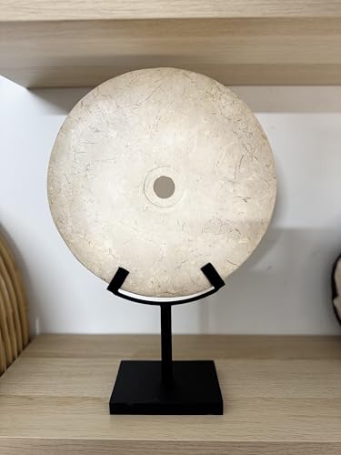 Elegant white decorative stone disc in oriental style, enhanced on a matte black metal base ideal to complement interiors with modern, zen or eclectic styles
