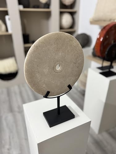 Elegant white decorative stone disc in oriental style, enhanced on a matte black metal base ideal to complement interiors with modern, zen or eclectic styles