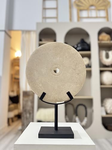 Elegant white decorative stone disc in oriental style, enhanced on a matte black metal base ideal to complement interiors with modern, zen or eclectic styles