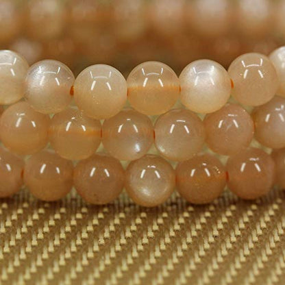 Angelstones Handmade Natural Healing Gemstone 6mm Round Beads Stretch Crystal Bracelet 7 Inch Unisex - color: Red Sunstone