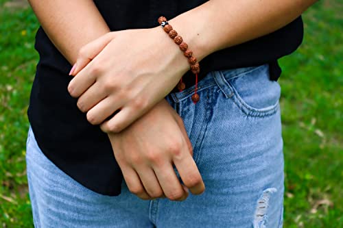 Hands of Tibet Tibetan Mala Rudraksha Seed Wrist Mala Bracelet with Carved Om Mani Conch Shell Spacer Free Silk Pouch
